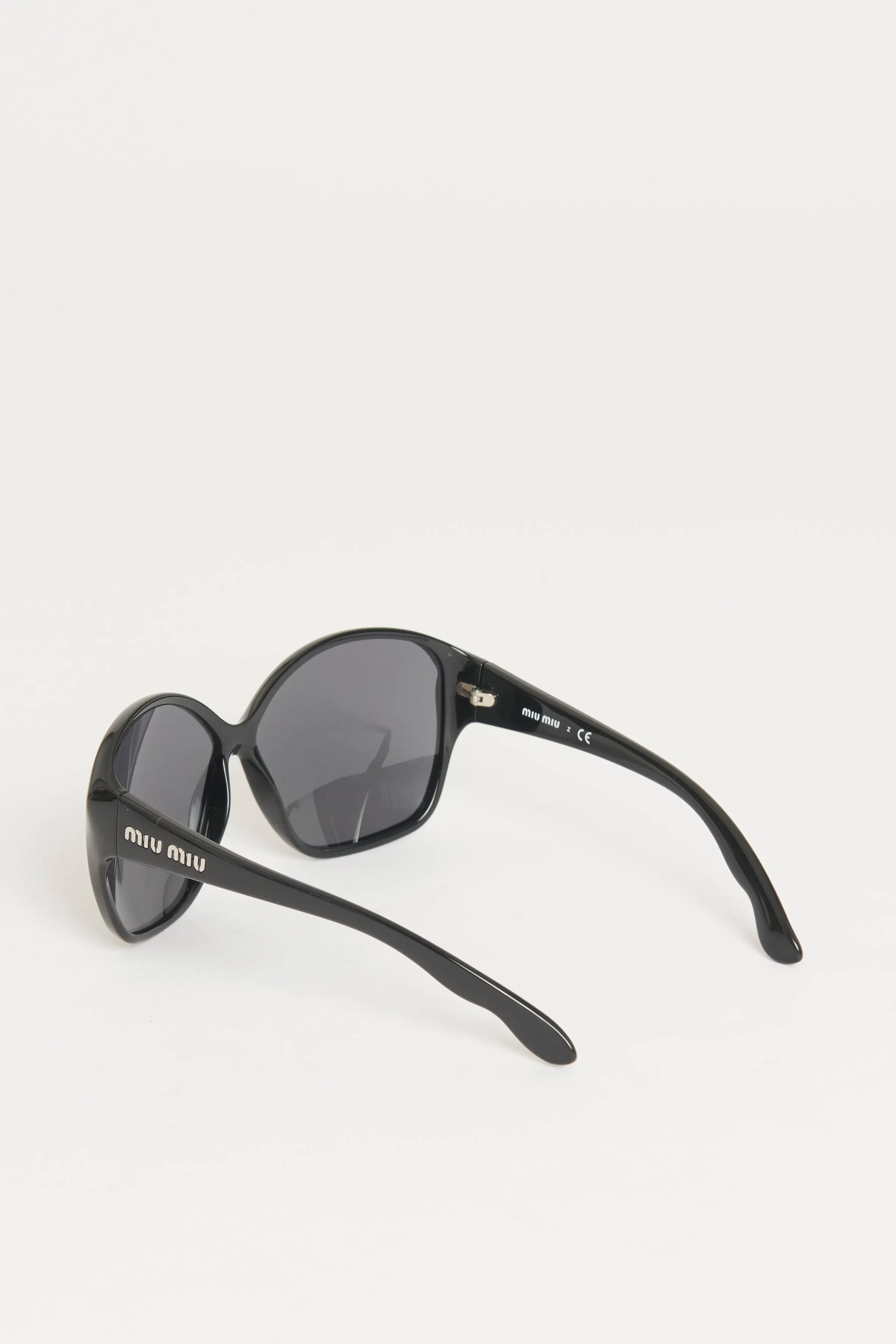 Black Acetate Oversized Preowned Sunglasses With Silvertone Logo At Arms